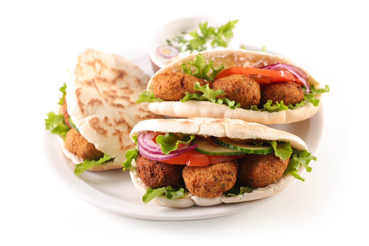 Metro Canteens Adelaide, healthy canteen supplies in Adelaide image of 3 salad and falafel pitta bread rolls on a white plate.